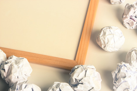 Paper Balls with blank white board for your edit.の写真素材