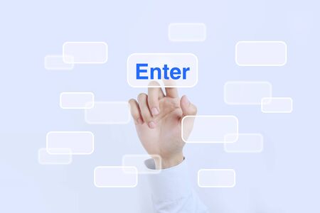 Businessman is pressing the enter button on the transparent screen.の写真素材