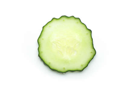 Sliced cucumber is isolated on the white background.の写真素材