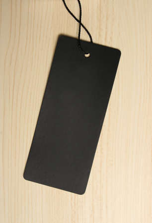 Blank label is on the wooden textured background.