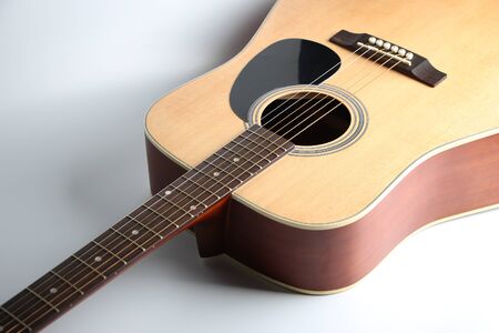 Closeup shot photo of the acoustic guitar.