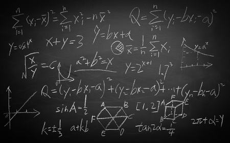 Maths formulas written by white chalk on the blackboard background.の写真素材