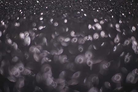 Bokeh glitter abstract background wallpaper for wedding and Christmas festival design.