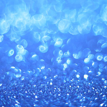 Bokeh glitter abstract background wallpaper for wedding and Christmas festival design.の写真素材