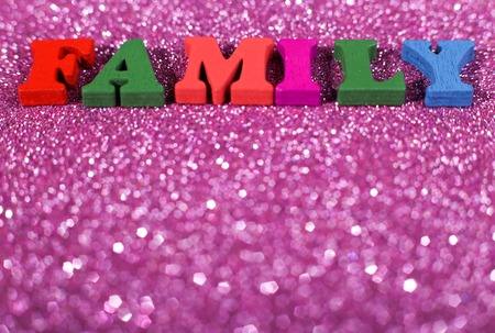 The colorful word Family on the glittering background.の写真素材