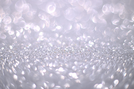 Bokeh glitter abstract background wallpaper for wedding and Christmas festival design.の写真素材
