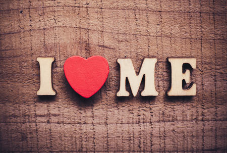 I Love Me with rustic wooden background.の写真素材