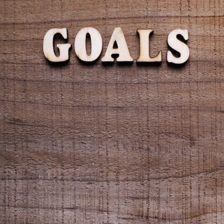 Goals Wooden text with rustic wooden background.の写真素材