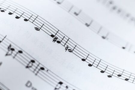 Closeup picture of music sheet with some music notes.の写真素材