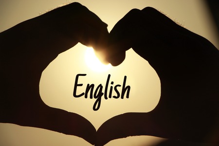 The heart shape made of hands with the word English. English Learning concept.の写真素材