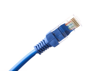 Blue network cable is isolated on white background.