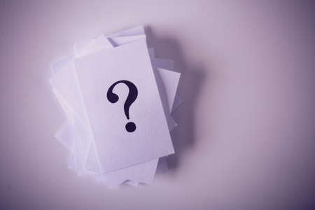 Closeup shot of a lot of paper with Question mark.の写真素材