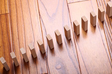 A lot of wooden block standing in a line.の写真素材