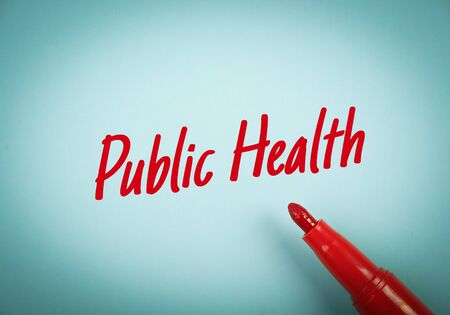 Text Public Health written on blue paper with red mark pen aside.の写真素材