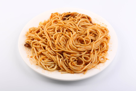 A plate of spaghetti pasta isolated on white background.の写真素材