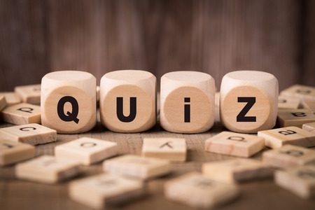 Quiz Concept with old wooden background.の写真素材