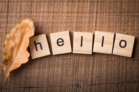 Hello Autumn Concept on the wooden table.の写真素材
