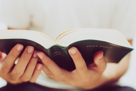 Closeup shot of reading holy bible.の写真素材