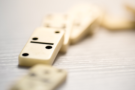 Domino effect shot on white background.の写真素材