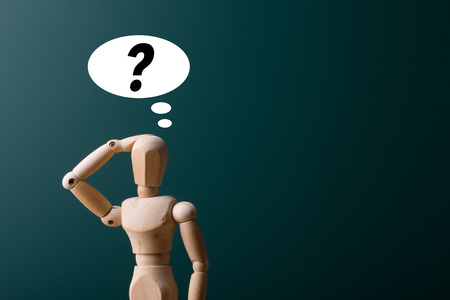 Thinking man concept with question mark aside.の写真素材