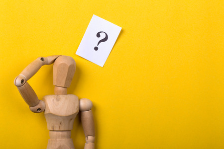 Thinking man concept with question mark aside.の写真素材