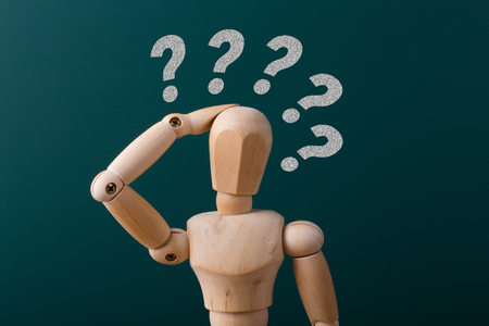 Thinking man concept with question mark aside.の写真素材