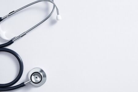 Stethoscope on white background with copy space top view.の写真素材