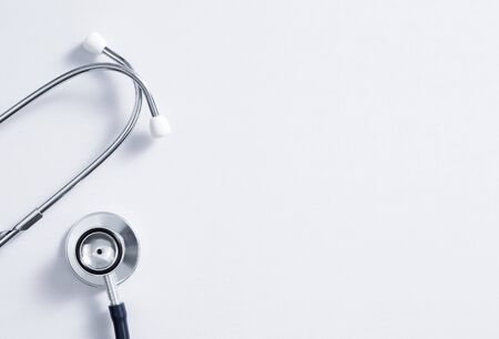 Stethoscope on white background with copy space top view.の写真素材