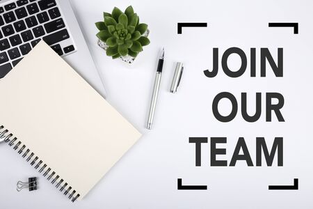 Join Our Team, the phrase is on office table desktop background. Business concept, strategy, plan, planning.の写真素材