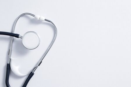 Stethoscope on white background with copy space top view.の写真素材