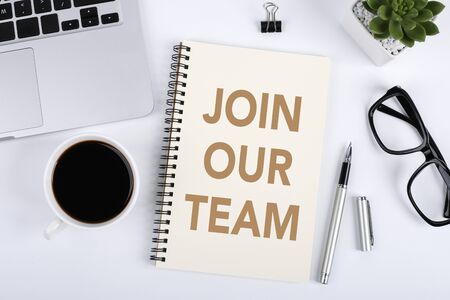 Join Our Team, the phrase is on office table desktop background. Business concept, strategy, plan, planning.の写真素材