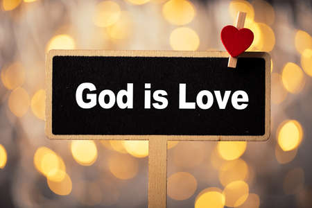 God is Love concept signboard with beautiful background.の写真素材