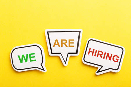 We Are Hiring speech bubble isolated on yellow background.