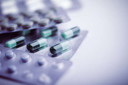 Pharmacy theme of medicine tablets closeup shot.の写真素材