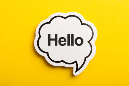 Hello speech bubble isolated on the yellow background.の写真素材