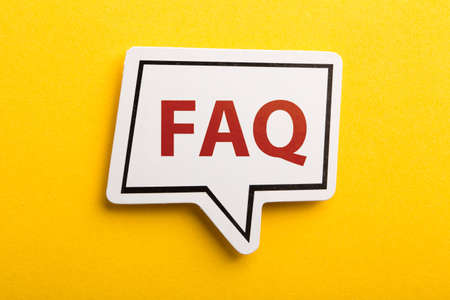 FAQ speech bubble is isolated on yellow background.の写真素材