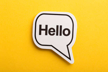 Hello speech bubble isolated on the yellow background.の写真素材