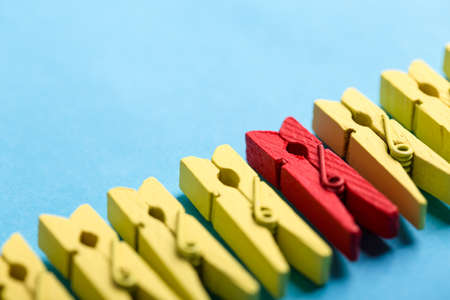 Stand out from the crowd and different concept. Leadership and other similar concepts. One red...