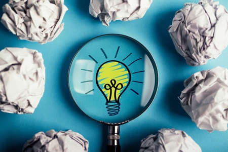 Creative Idea And Innovation Concept with magnifying on blue background.の写真素材