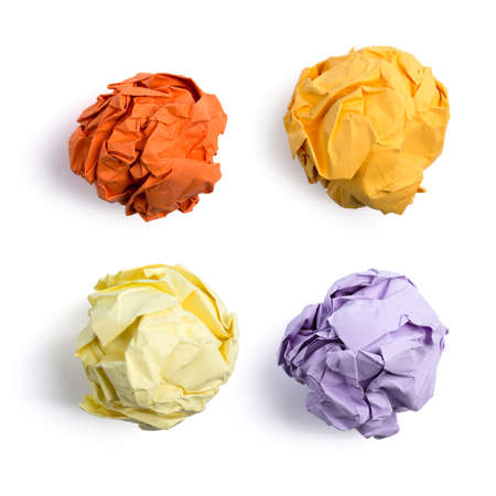 Collection of colorful crumpled paper balls isolated on white background.の写真素材