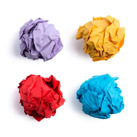 Collection of colorful crumpled paper balls isolated on white background.の写真素材