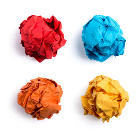 Collection of colorful crumpled paper balls isolated on white background.の写真素材