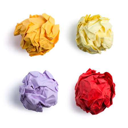Collection of colorful crumpled paper balls isolated on white background.の写真素材