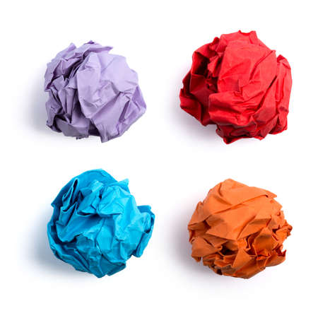 Collection of colorful crumpled paper balls isolated on white background.の写真素材