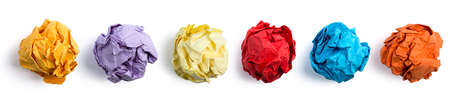 Collection of colorful crumpled paper balls isolated on white background.の写真素材