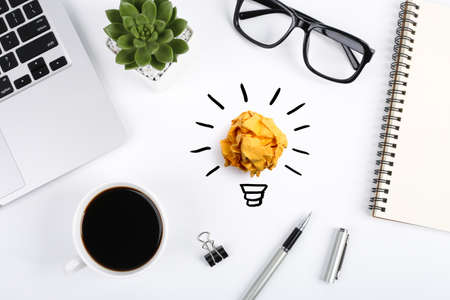 Concept creative idea and innovation with paper ball on desktop topview.の写真素材