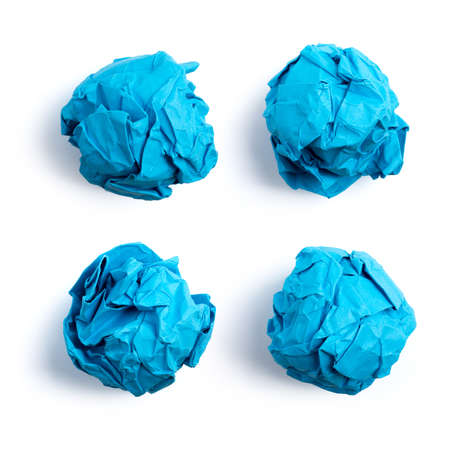Collection of colorful crumpled paper balls isolated on white background.の写真素材