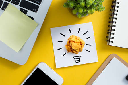 Concept creative idea and innovation with paper ball on desktop top view.の写真素材