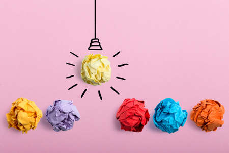 Inspiration concept crumpled paper light bulb metaphor for good idea.の写真素材