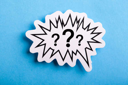 Question Mark speech bubble isolated on blue background.の写真素材